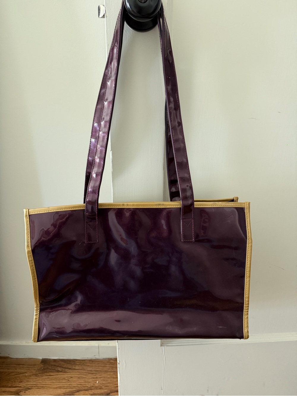 Purple and gold plastic tote bag